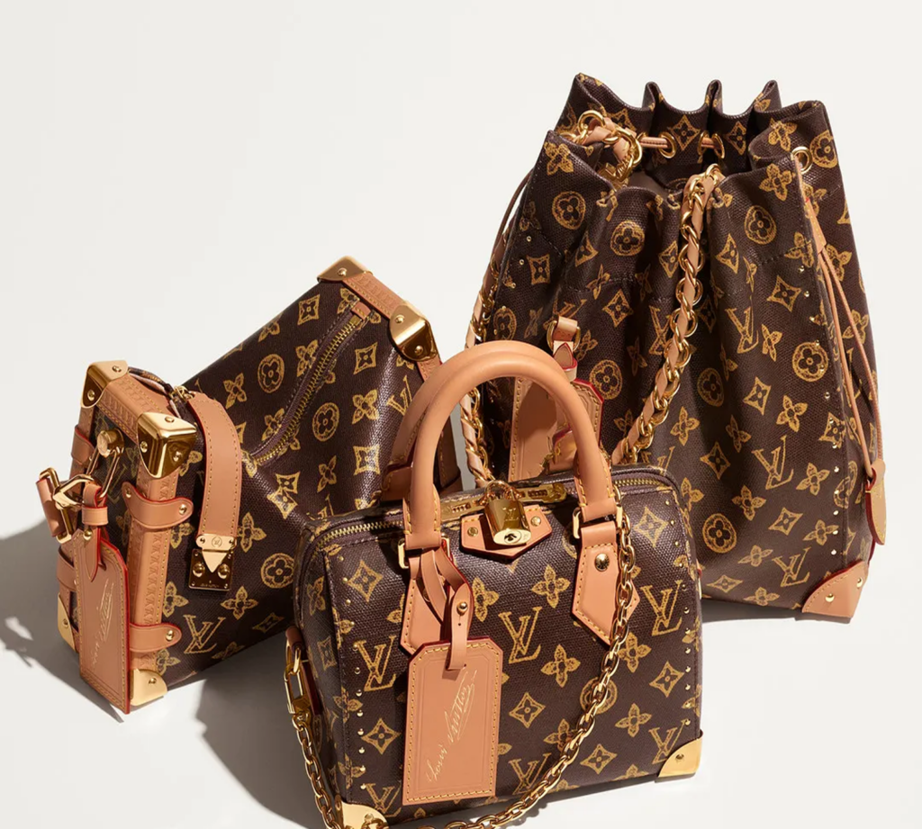 Iconic Louis Vuitton Monogram across travel pieces and bags, connecting heritage, function, and cultural desire.
