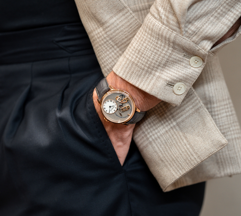 Arnold & Son DSTB Stop-Seconds Platinum Kingsand with a platinum case and exposed watchmaking mechanism.